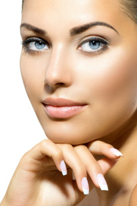 Face of Young Woman with Clean Fresh Skin. Skin care
